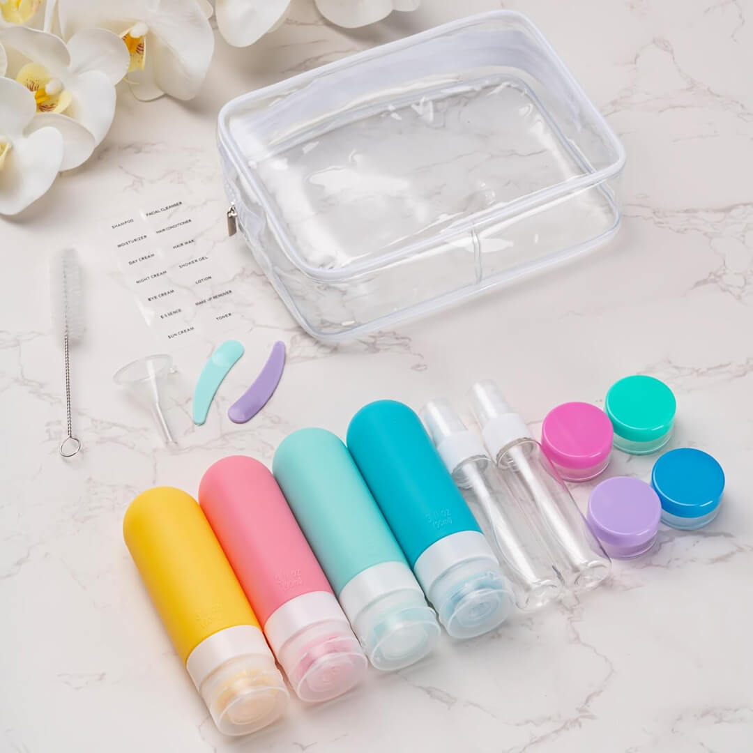 Set of colorful travel-sized bottles with a clear pouch