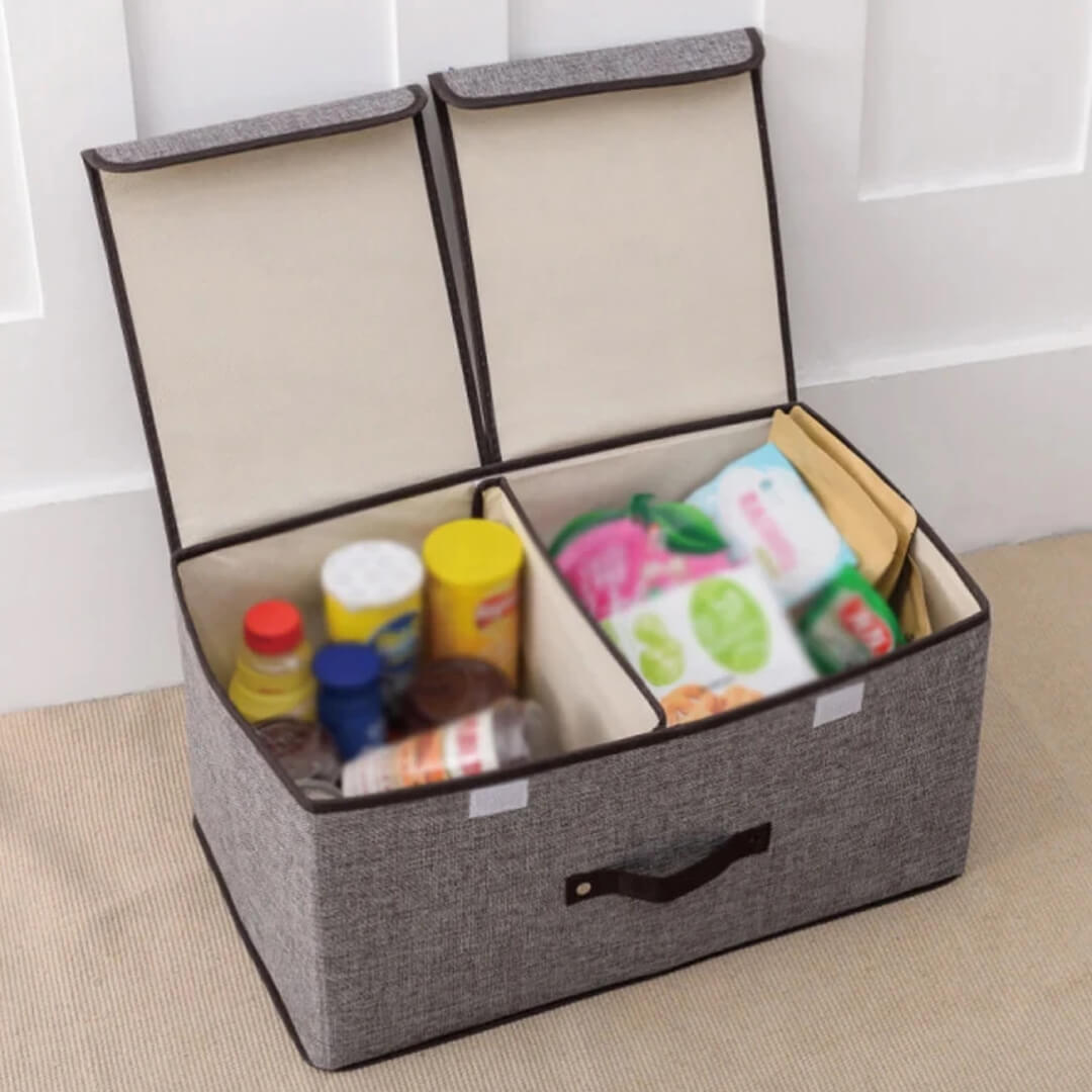 Storage box with lid, divider and handles in grey color, with kitchen items accessories inside the box