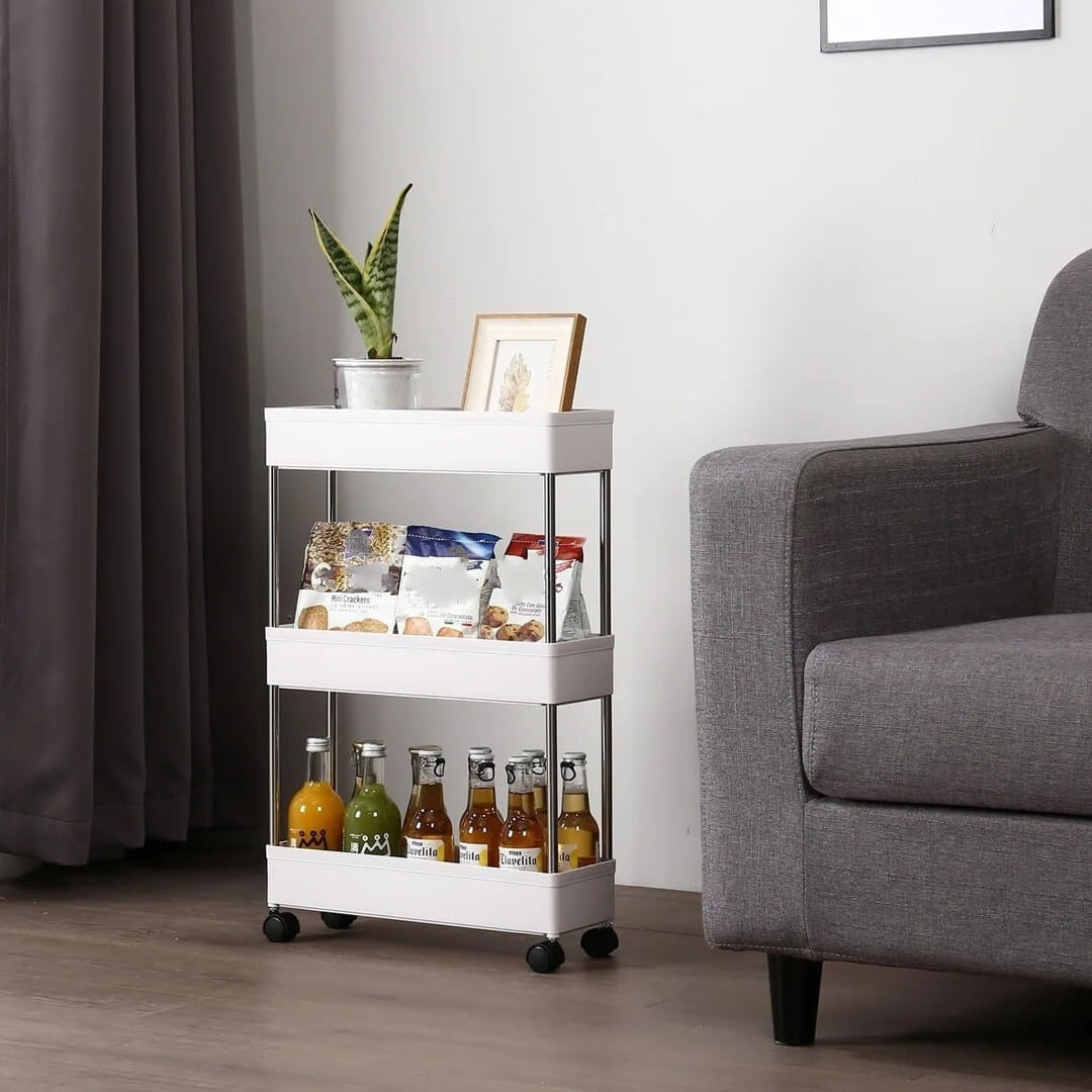 White plastic cart with three open baskets and wheels