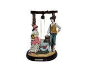 Girl and Boy with Bucket Figurine