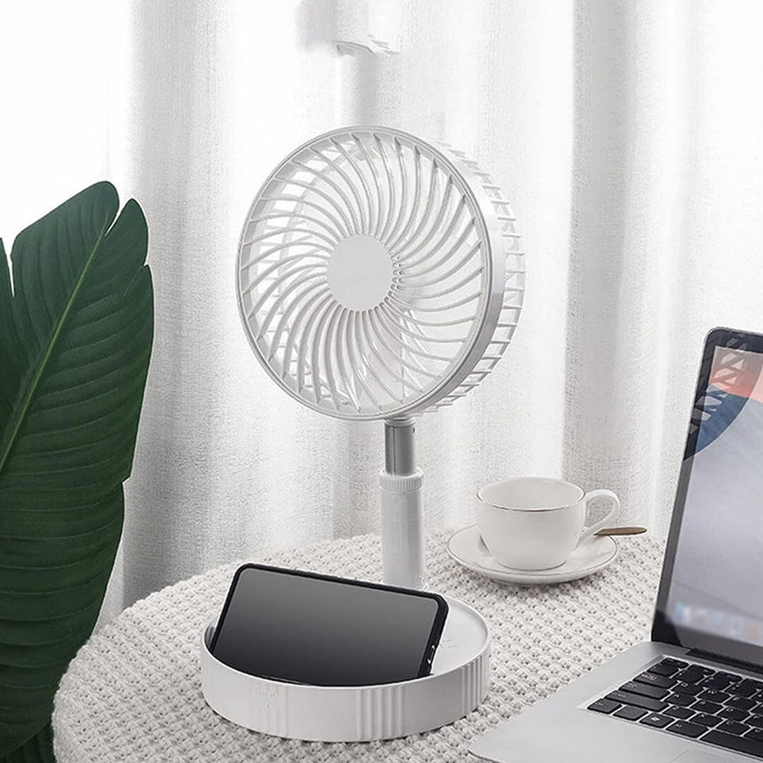 Foldable portable pedestal fan with adjustable height and phone holder