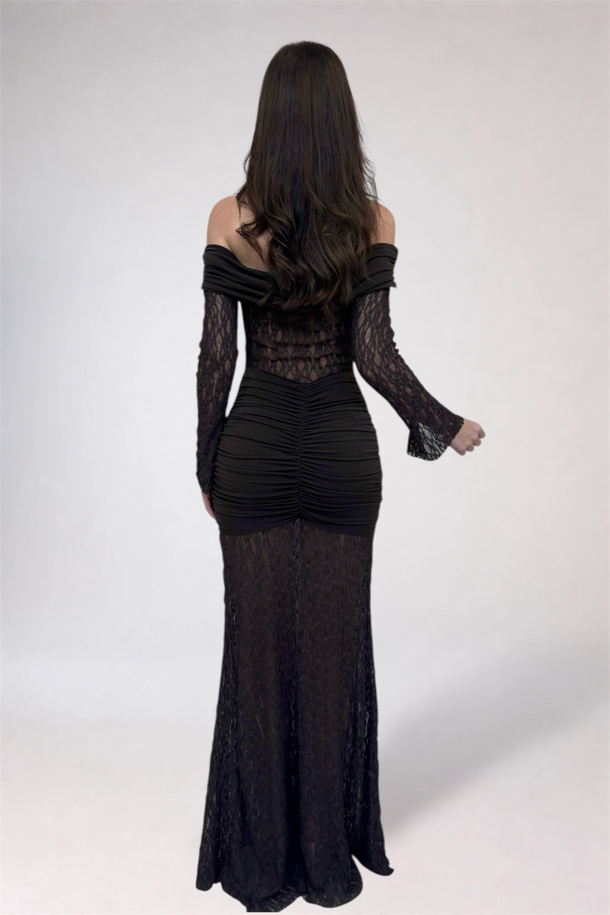 Black lace evening gown on a white background