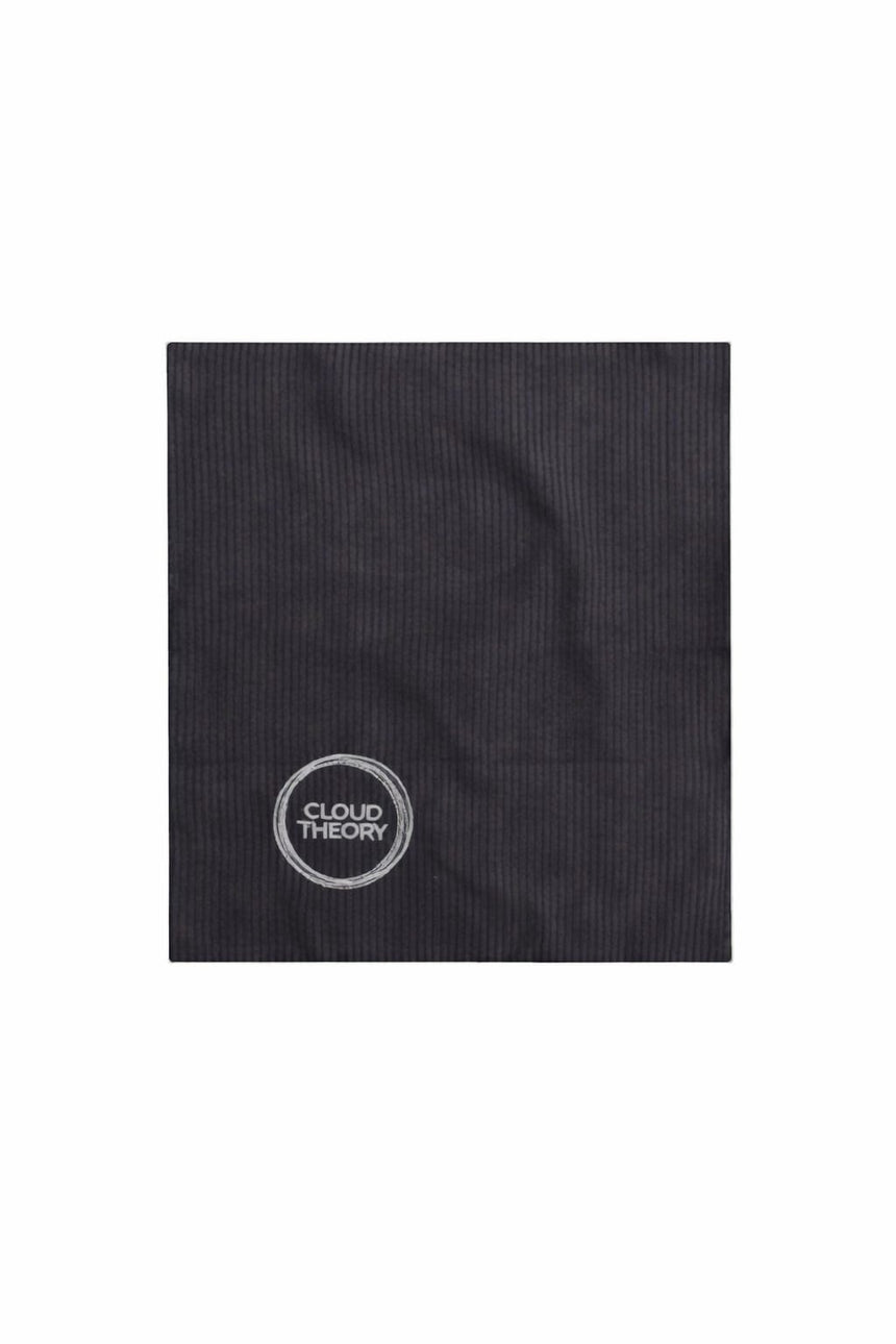 Cloud Theory microfiber towel rolled, with brand label