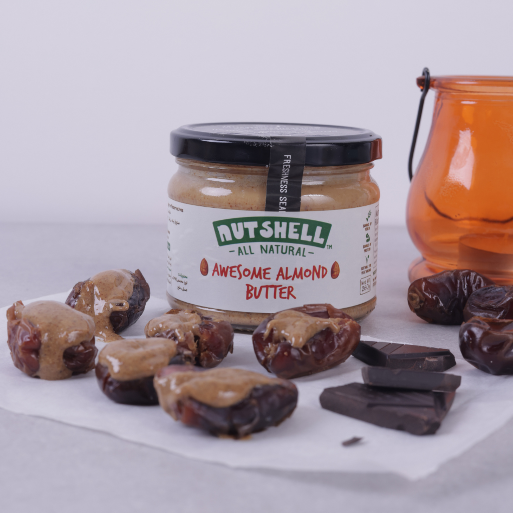 Creamy almond butter delicious on dates as a healthy snack
