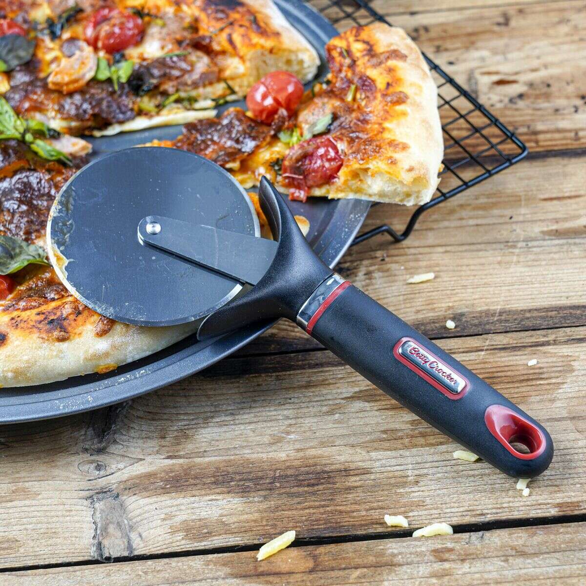 Stainless Steel Pizza Cutter, Rubber Handle  Stainless Steel Pizza Cutter, Rubber Handle Stainless Steel Pizza Cutter, Rubber Handle Betty Crocker