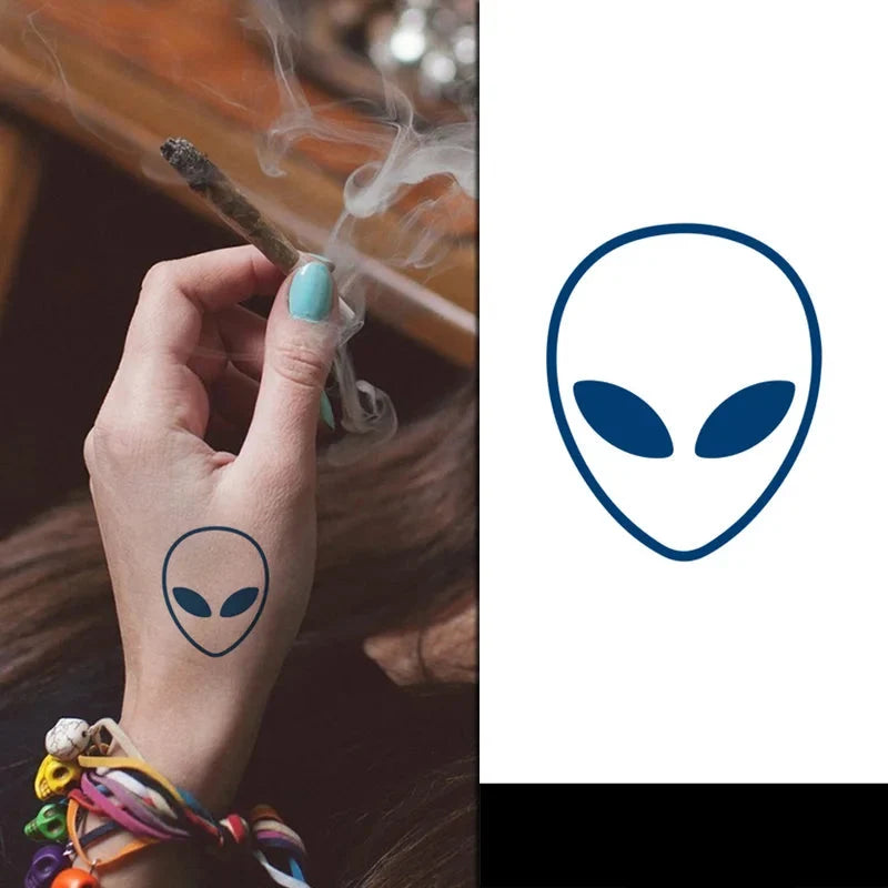 Hand with alien tattoo holding a joint, next to an alien head logo