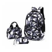 Black and grey geometrics school backpack with matching lunch bag and pecil case