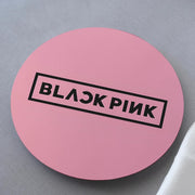 Pink round product with 'BLACKPINK' logo on a gray background
