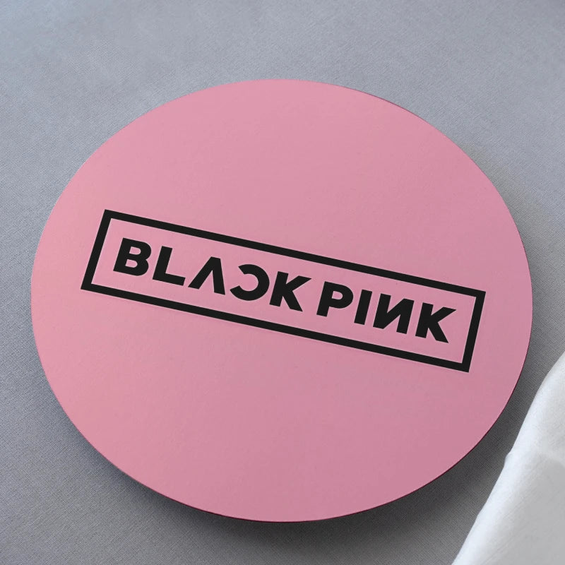 Pink round product with 'BLACKPINK' logo on a gray background