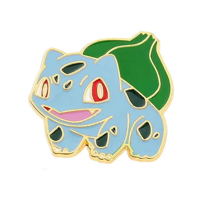 Enamel pin of a blue creature with a green leaf on a white background