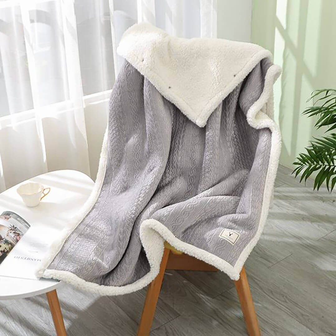 Stylish wearable grey blanket scarf providing warmth and softness