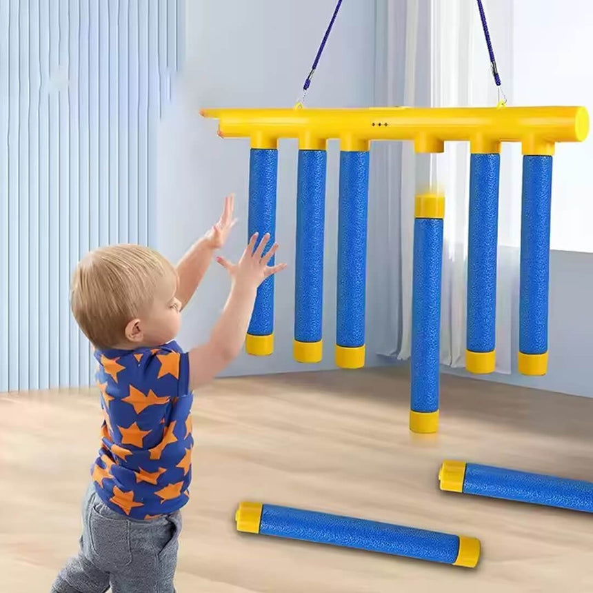 Kids catching sticks reaction and coordination challenge game