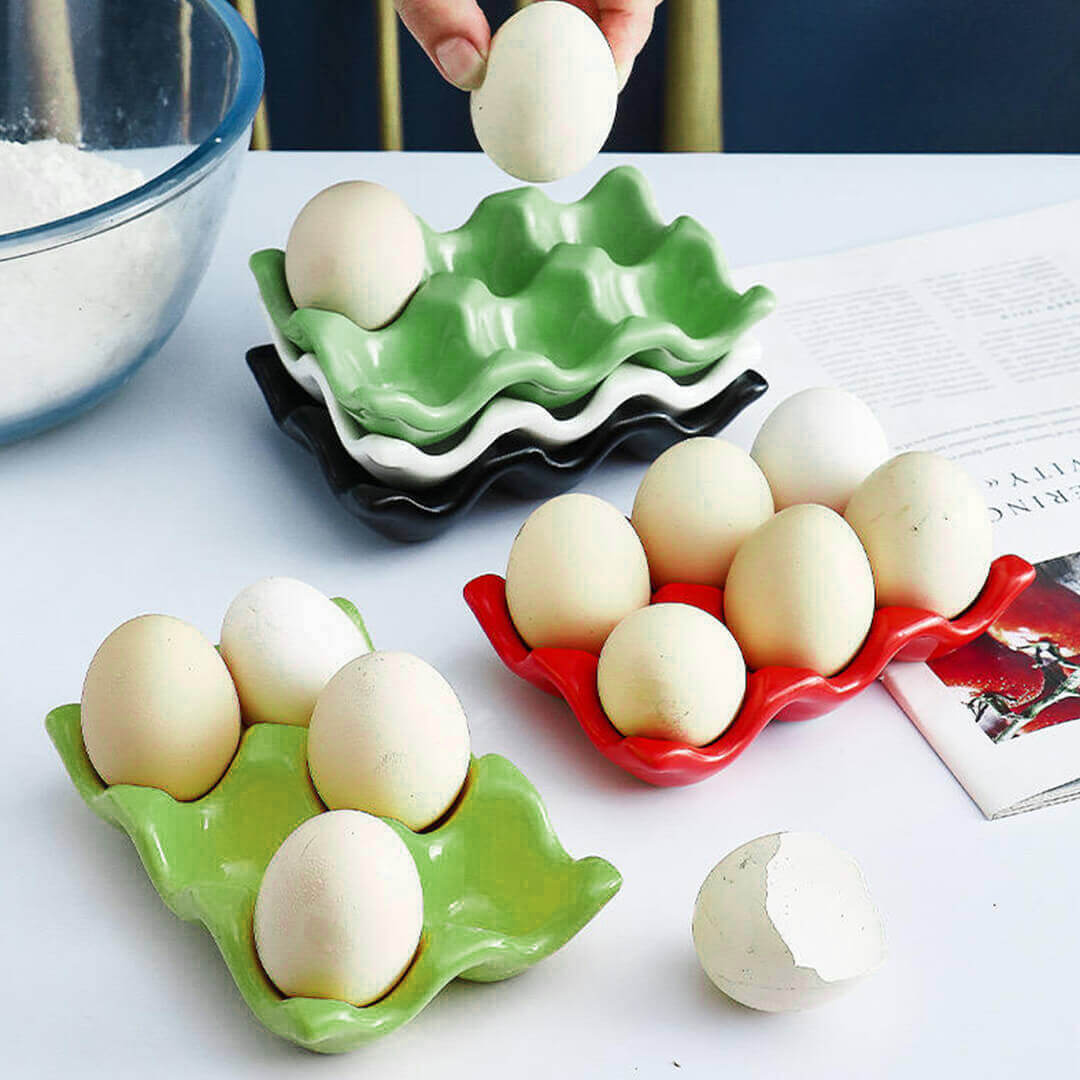 Ceramic egg holders in green and  red fitting 6 eggs