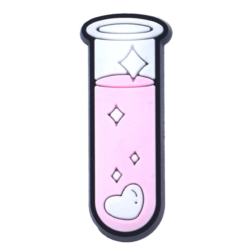 A collection of six Chemistry-themed Jibbitz charms for Crocs, featuring various chemical symbols and elements such as a beaker, an atom, and a periodic table.