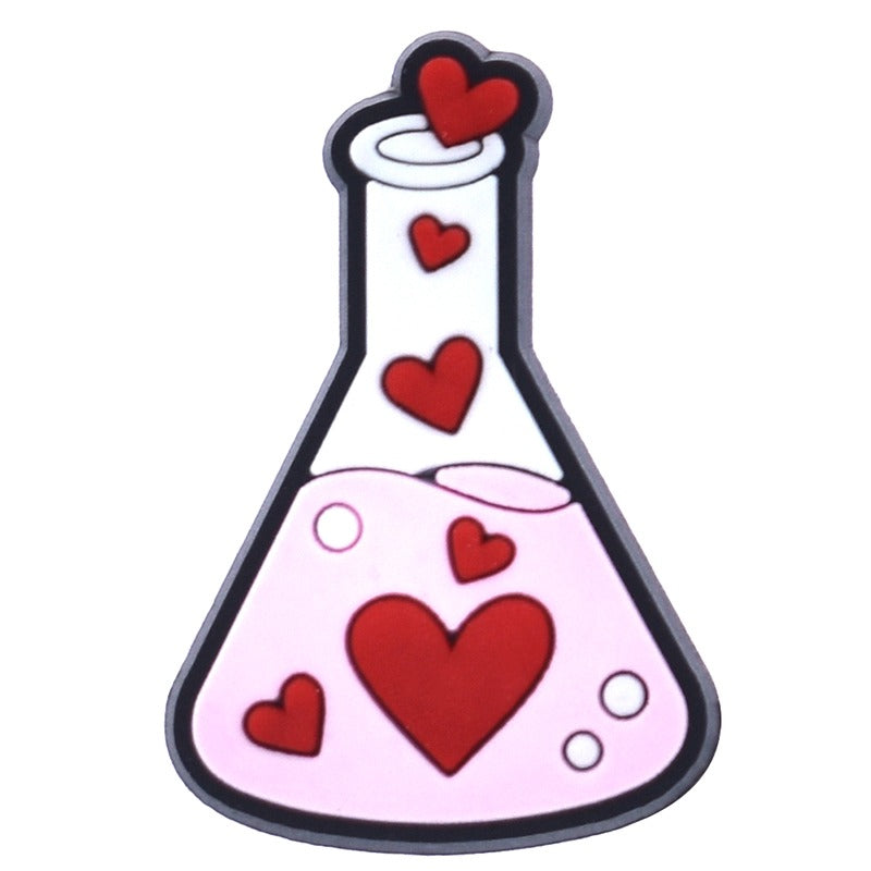 A collection of six Chemistry-themed Jibbitz charms for Crocs, featuring various chemical symbols and elements such as a beaker, an atom, and a periodic table.