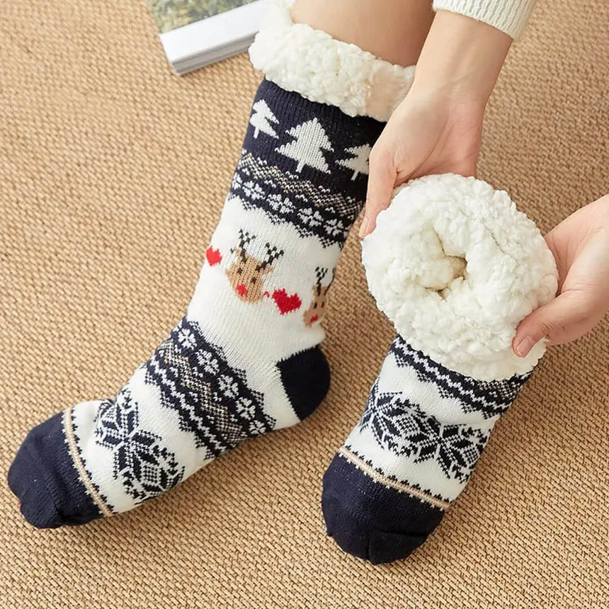 Warm Christmas socks with reindeer and snowflake pattern
