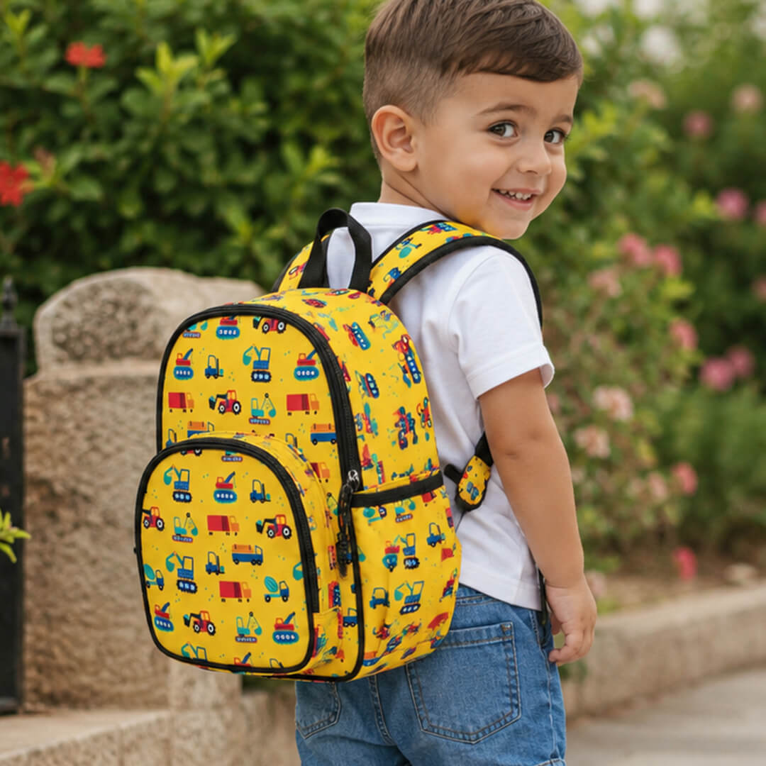 Yellow construction car-themed school backpack for preschool and kindergarten