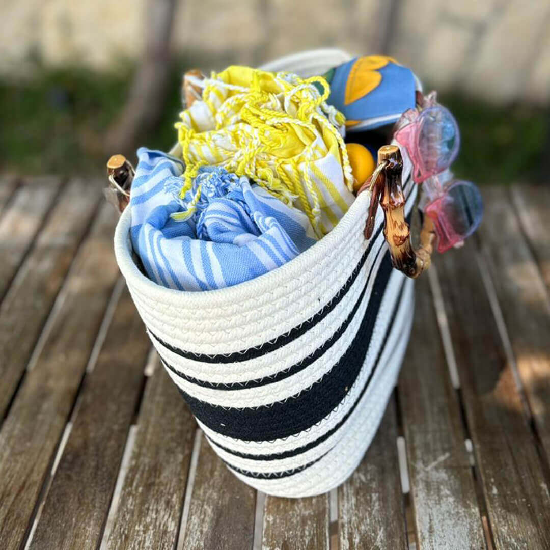 Stylish striped beach tote bag with bamboo handles