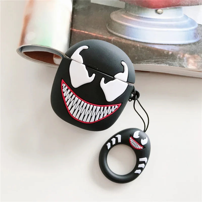 Black case with a cartoonish face design on a white surface