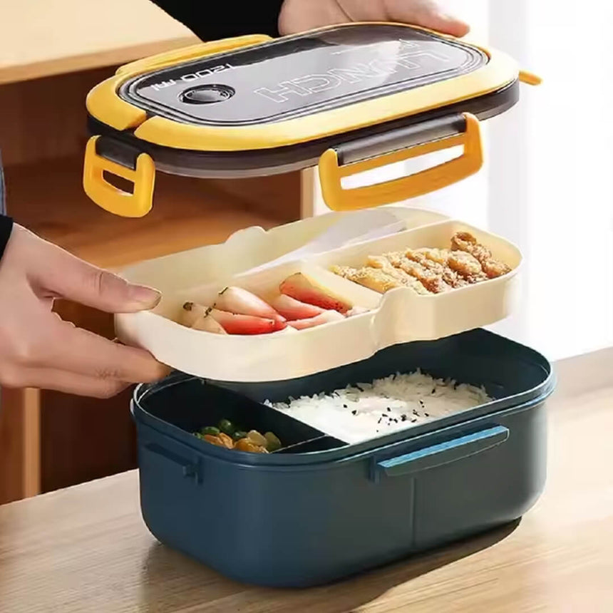 School lunch box with spoon and fork and removable tray for fruits