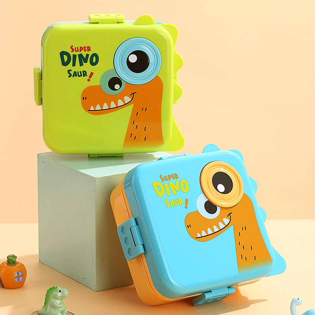 Dinosaur-themed lunch boxes with a smiling-face sauce container