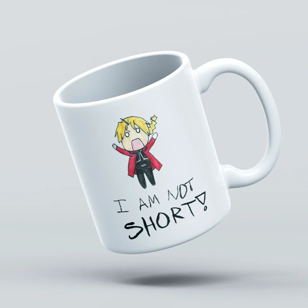 White mug with a cartoon character and text 'I AM NOT SHORT!' on a light gray background