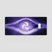 Phone case with a purple eye design on a light gray background