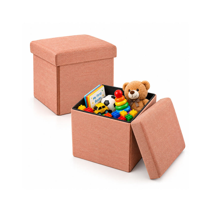 Peach-colored foldable fabric storage stool with cushioned topfor toys, books and accessories organizer.