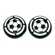 Two black and white soccer ball designs on a white background