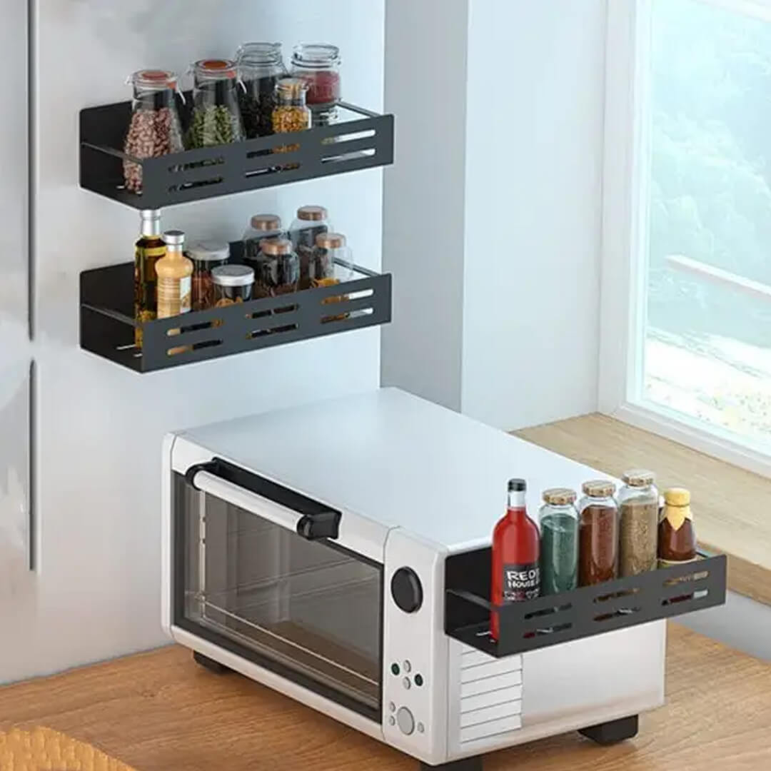 Set of two magnetic spice racks mounted on a stainless steel fridge