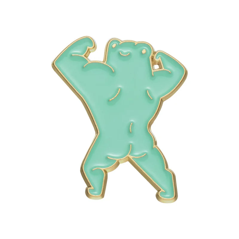 Turquoise frog-shaped enamel pin with gold accents on a white background