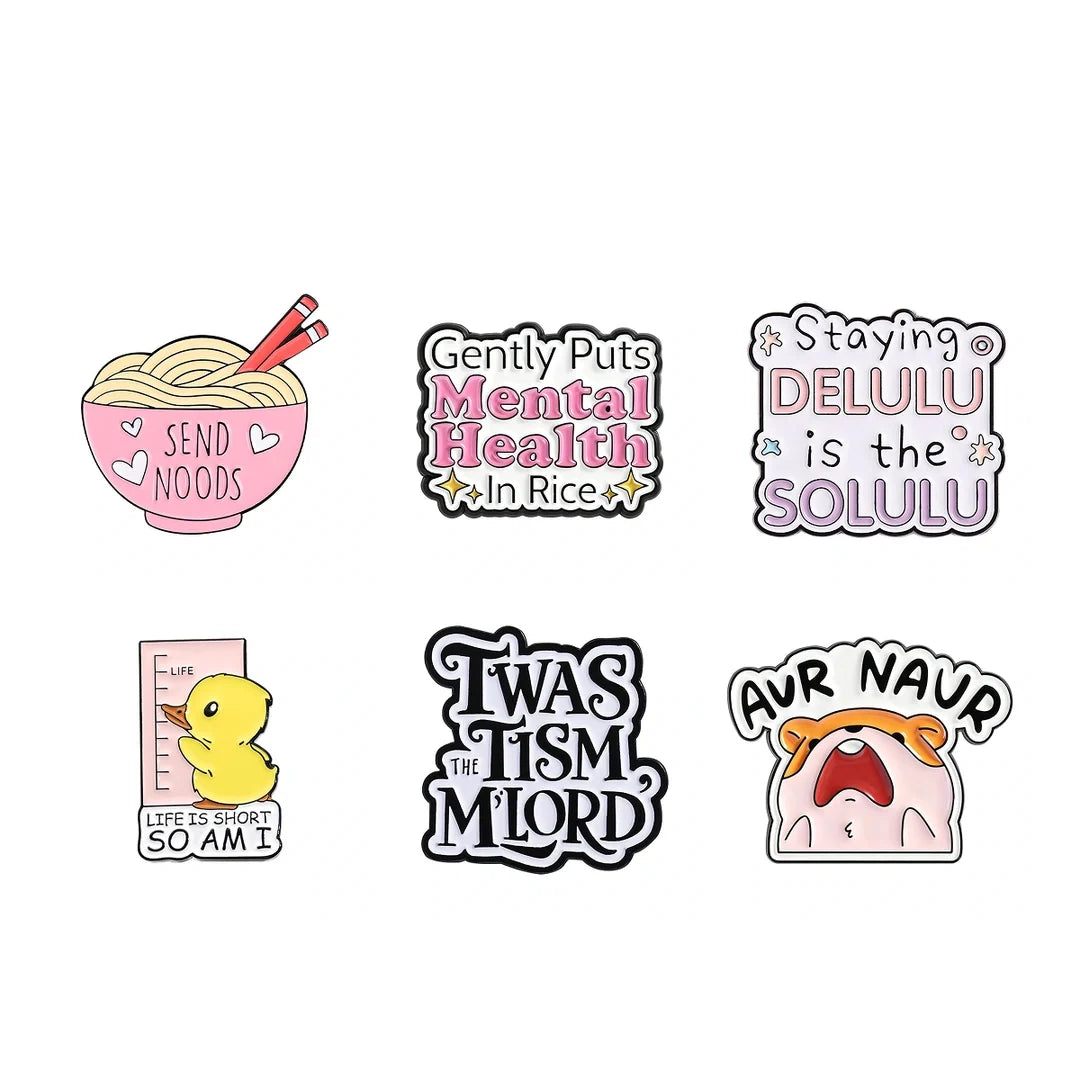 Six cartoon-style sticker or patch designs arranged on a plain white background. The designs include a pink noodle bowl with chopsticks, a text sticker reading 'Gently Putts Mental Health In Rice', a pink text sticker reading 'Staying DELULU is the SOLULU', a yellow duck with 'LIFE IS SUGAR SO AM I', black-and-white text reading 'TWAS THE TISM THE MIORD', and a pink character with orange hair and an open mouth.