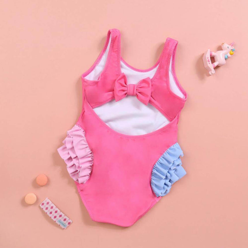 Pink swimwear for toddlers with playful seahorse design