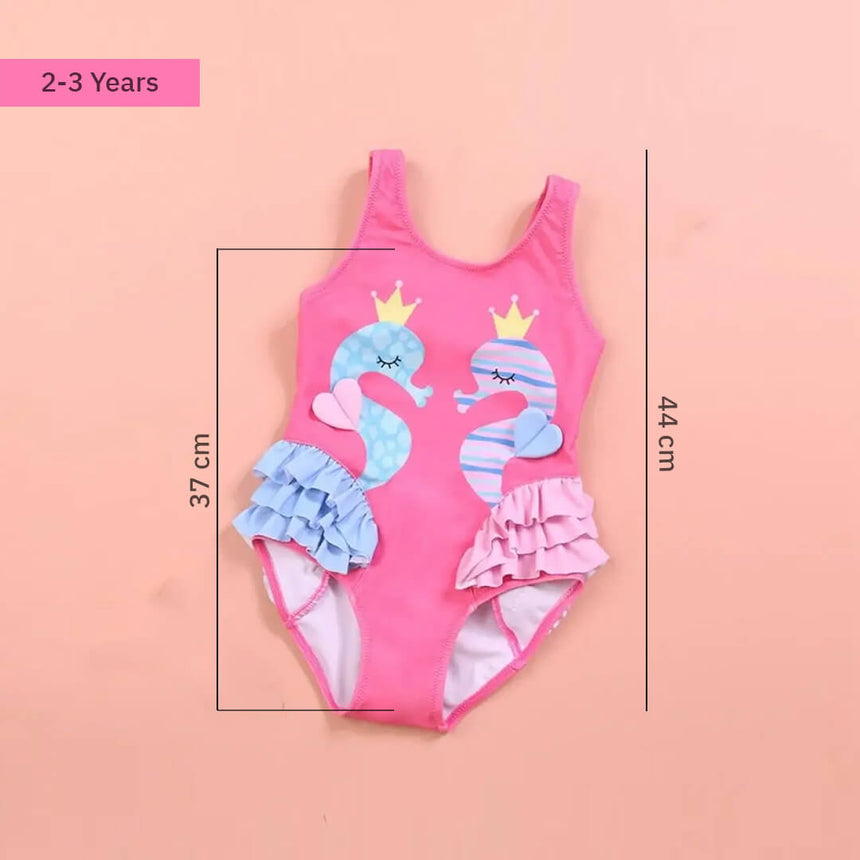 Toddler swimsuit with seahorse print and ruffle details