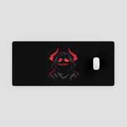 Black mouse pad with a hooded figure design on a light gray background