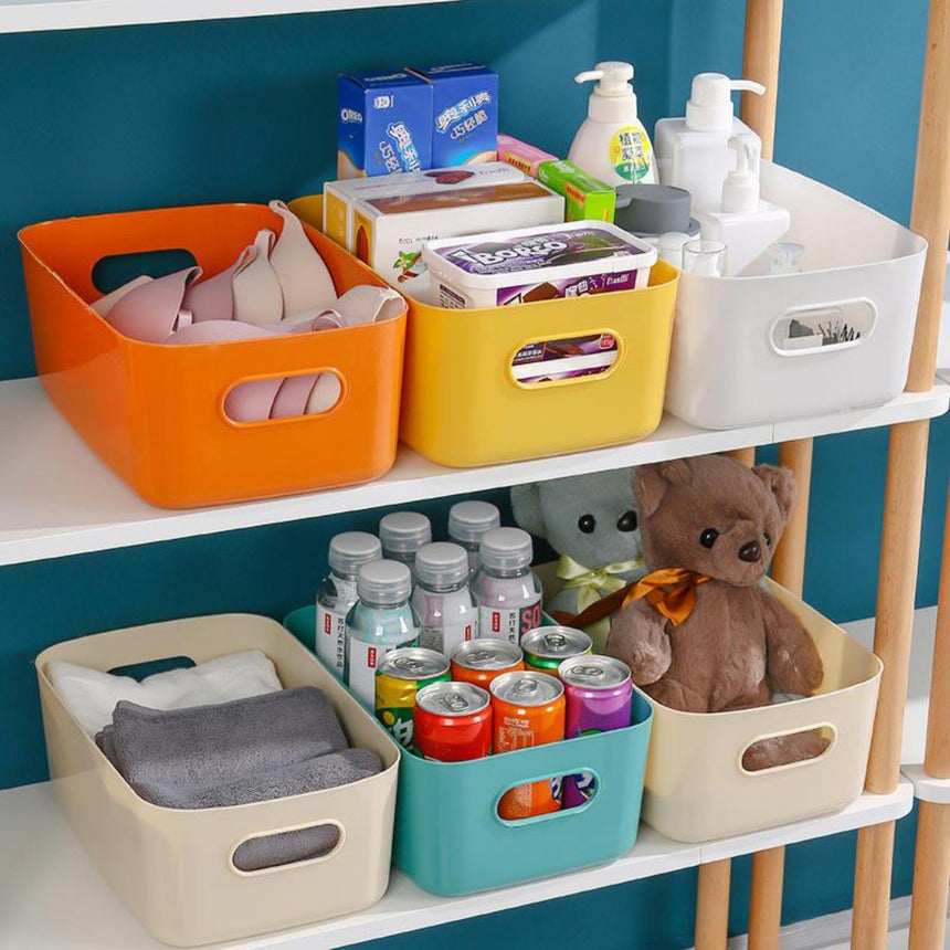 Multifunctional Handled Plastic Storage Box filled with kitchen and home accessories.
