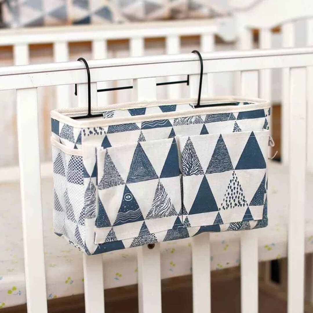 Hanging bedside organizer with multiple pockets