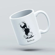 mug with black design and text "HOLLOW" on a gray background