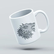 White mug with a wolf head design on a light gray background