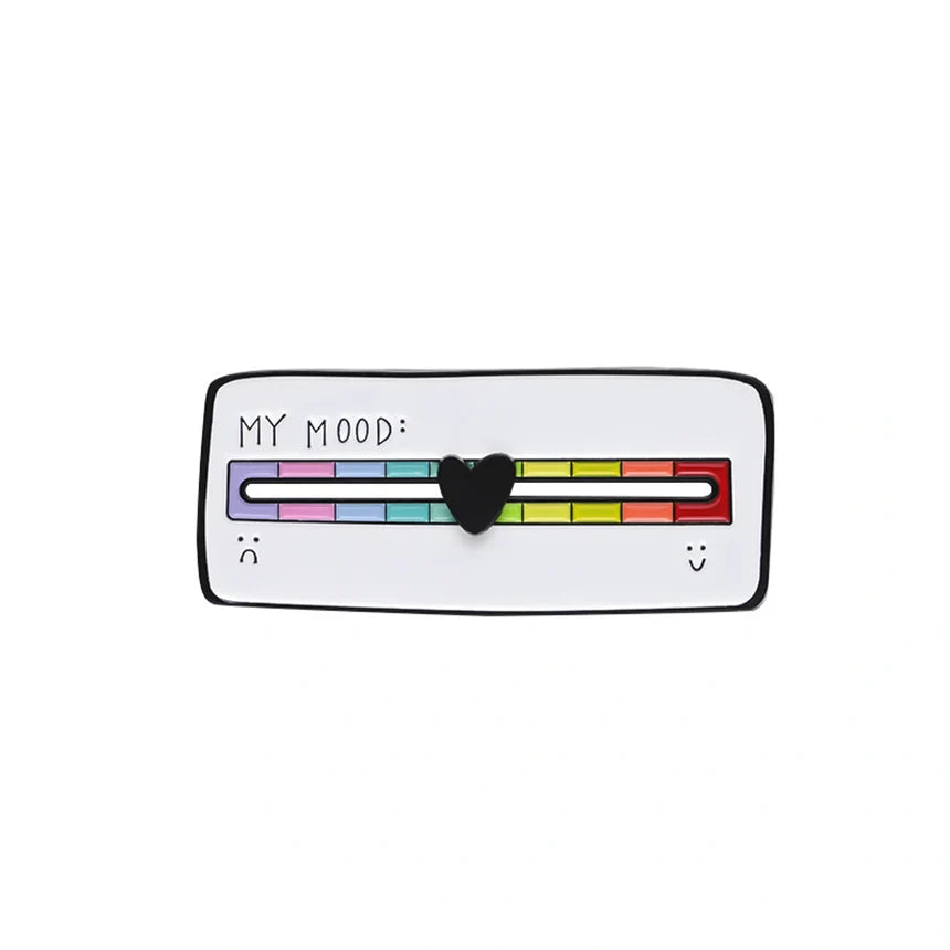A white enamel pin shaped like a mood meter with a black border, featuring a colorful rainbow scale labeled 'MY MOOD:' and a black heart in the center.