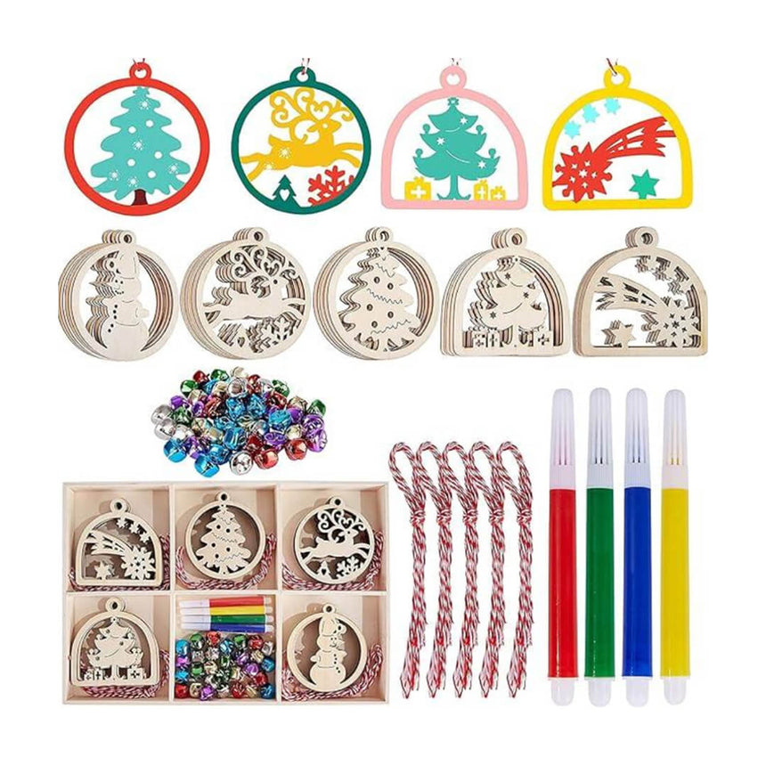 Assorted Christmas ornaments and craft supplies with coloring pencils