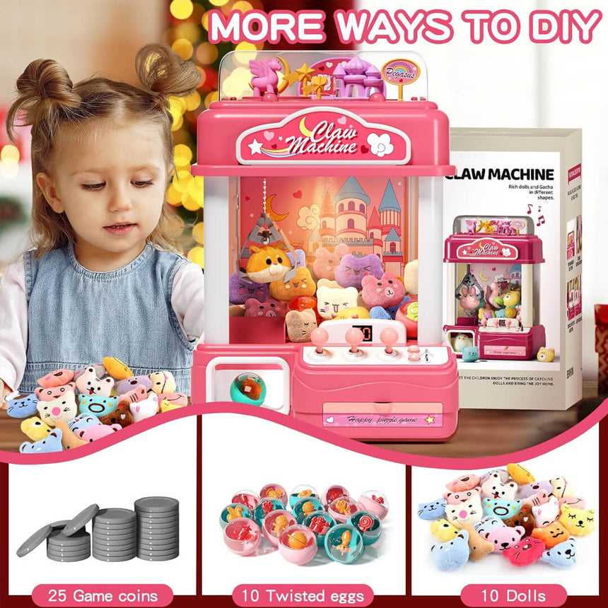 Pink toy claw machine with toys and accessories for kids