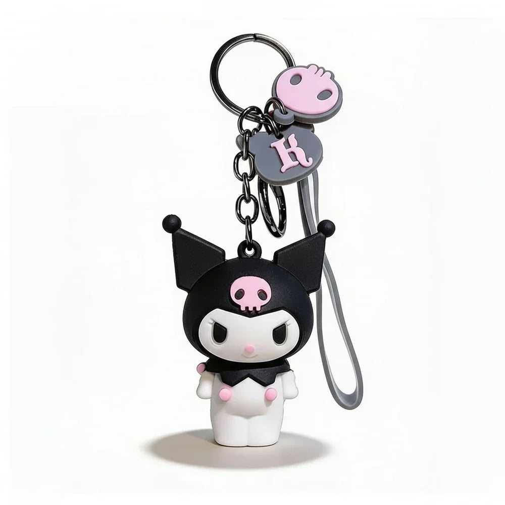 Cartoon character keychain with black hair and pink accents on a white background