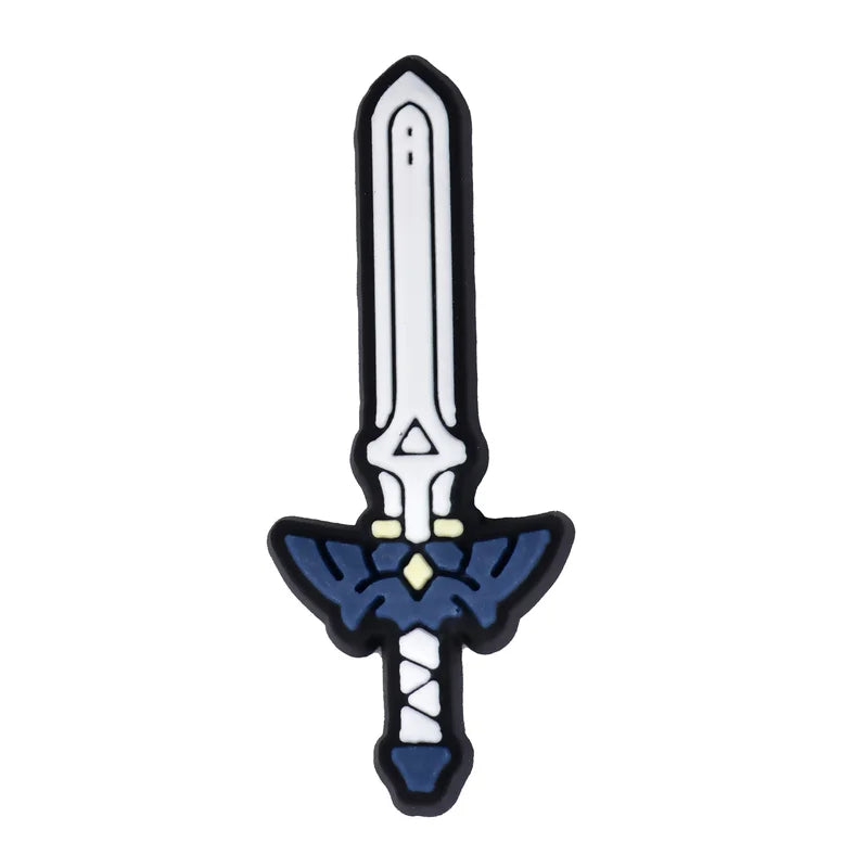 legend of zelda croc charms for crocs | jibbitz sword-shaped object with blue and black design on a white background