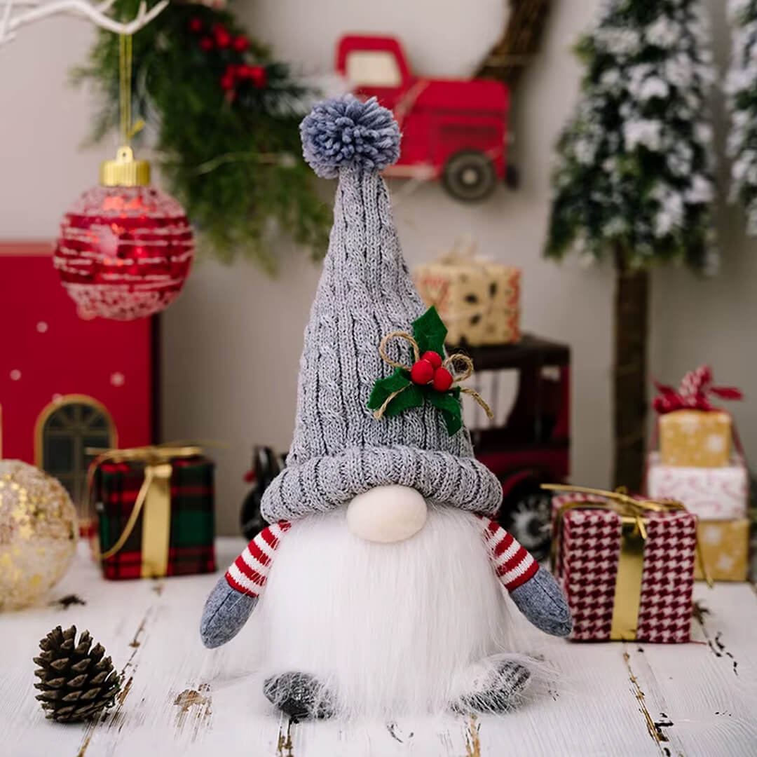Handmade glowing Christmas gnome in grey with tall knitted hat
