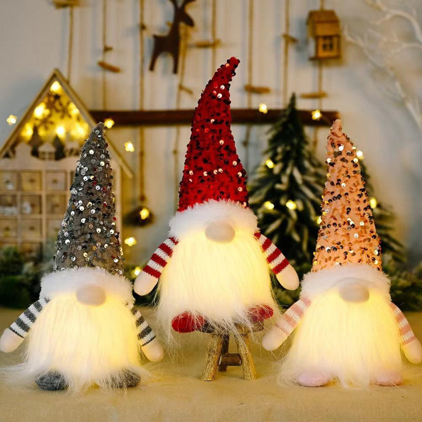 Christmas gnome made with glitter fabric and battery light