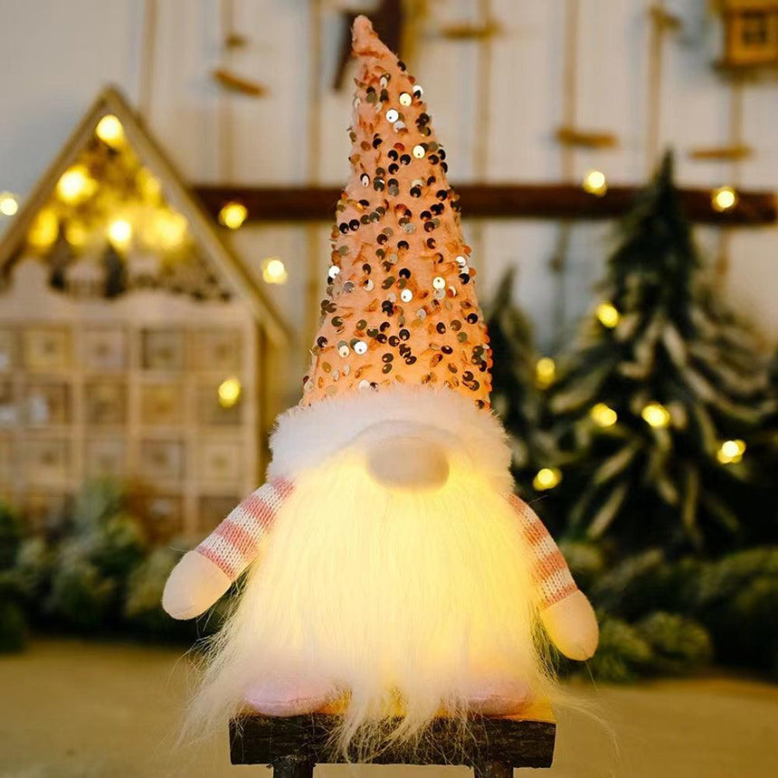 Sparkling pink Christmas gnome with soft LED light