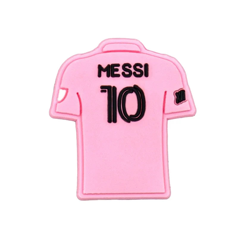 Pink soccer jersey with 'Messi 10' croc charm on a white background