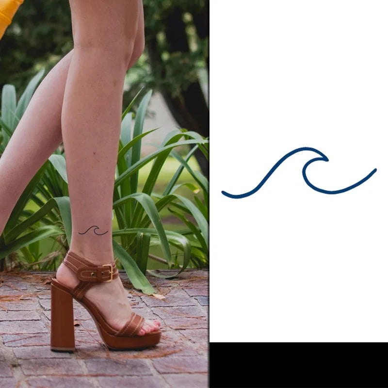 Person wearing brown high-heeled sandals with a wave tattoo on her ankle