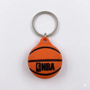 Basketball-shaped keychain with NBA logo on a white background